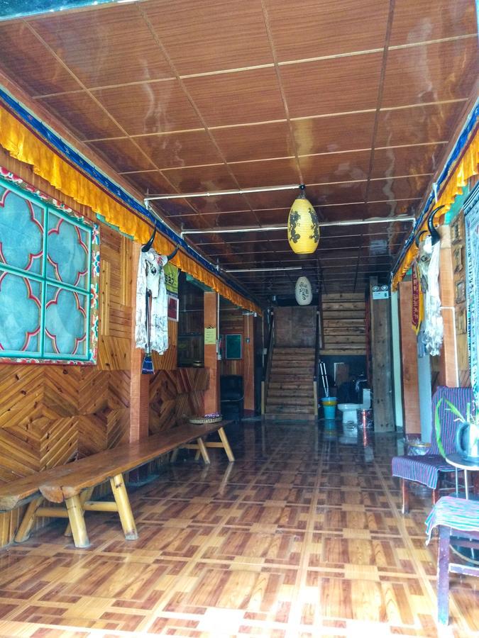 Zishuo Zihua Guest House Daocheng Exterior foto