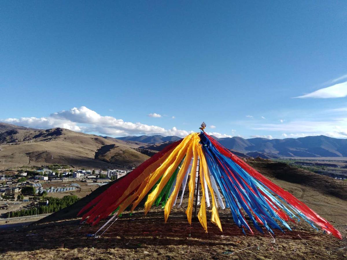 Zishuo Zihua Guest House Daocheng Exterior foto