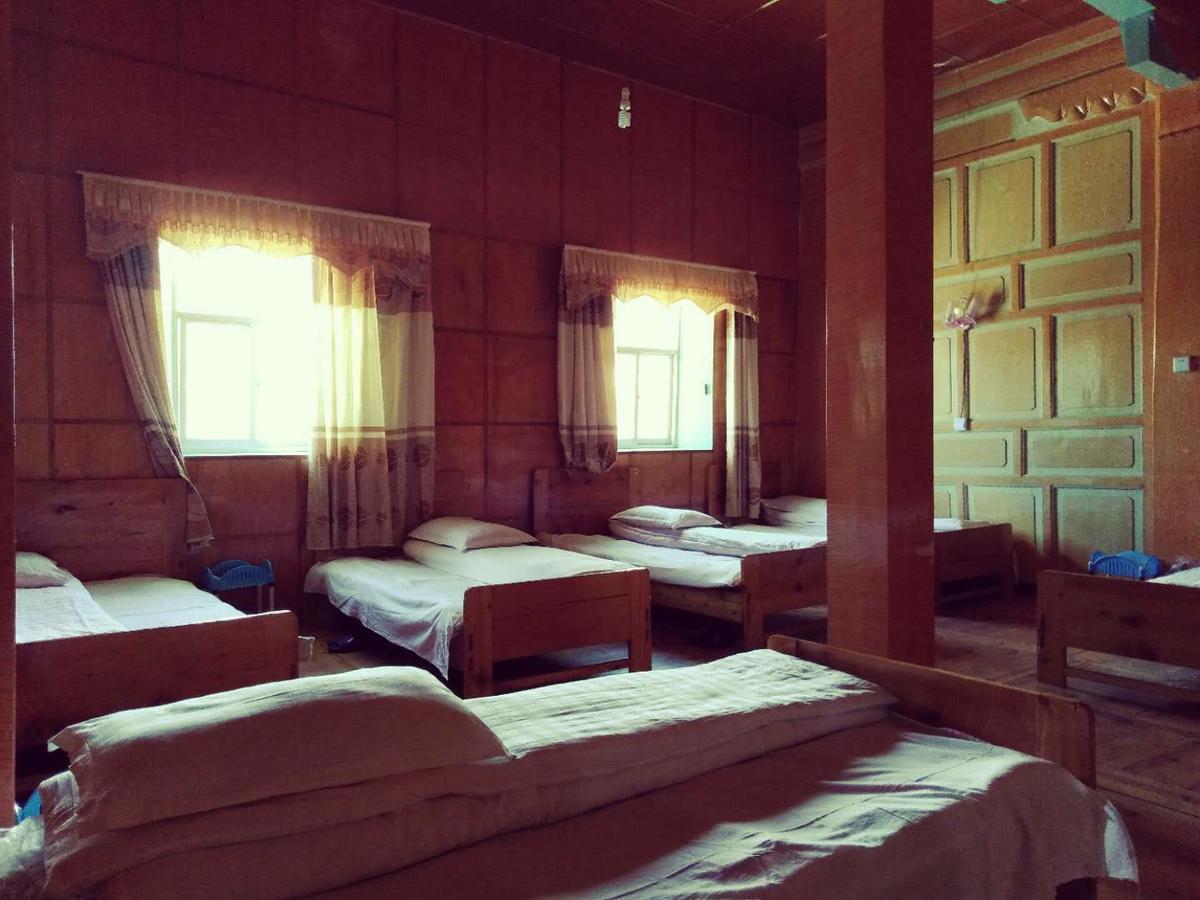 Zishuo Zihua Guest House Daocheng Exterior foto