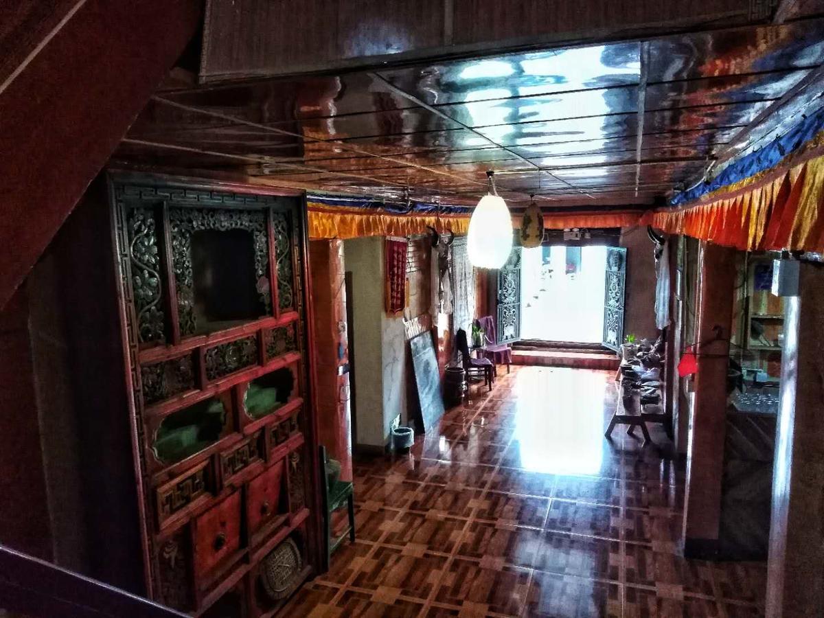 Zishuo Zihua Guest House Daocheng Exterior foto